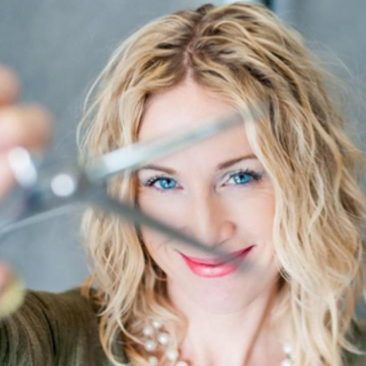 [Photo of Andrea Dudley]